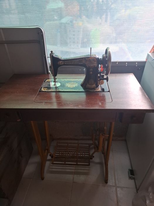 Maquina de costura singer
