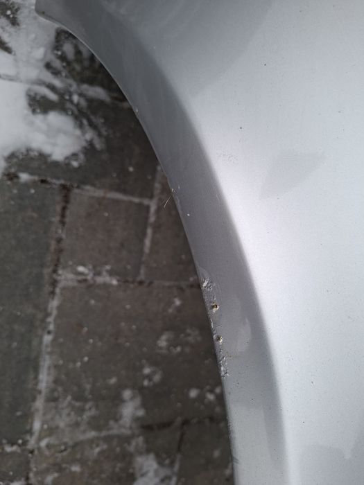 Audi a4 b7 blotnik przedni lewy srebrny ly7w