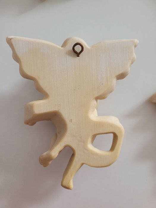 4 anjos músicos com instrumentos musicais