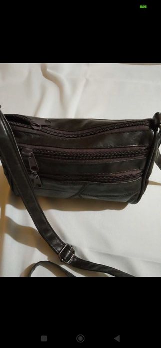 Mala à tiracolo ideal para passeios ao ar livre consultar a descrição.