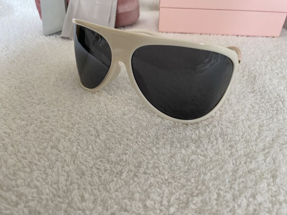 Okulary Miu Miu SMU A01