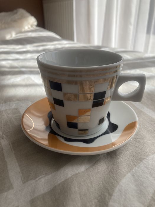 Filiżanka porcelanowa ze spodkiem - World Gifts Pierrot
