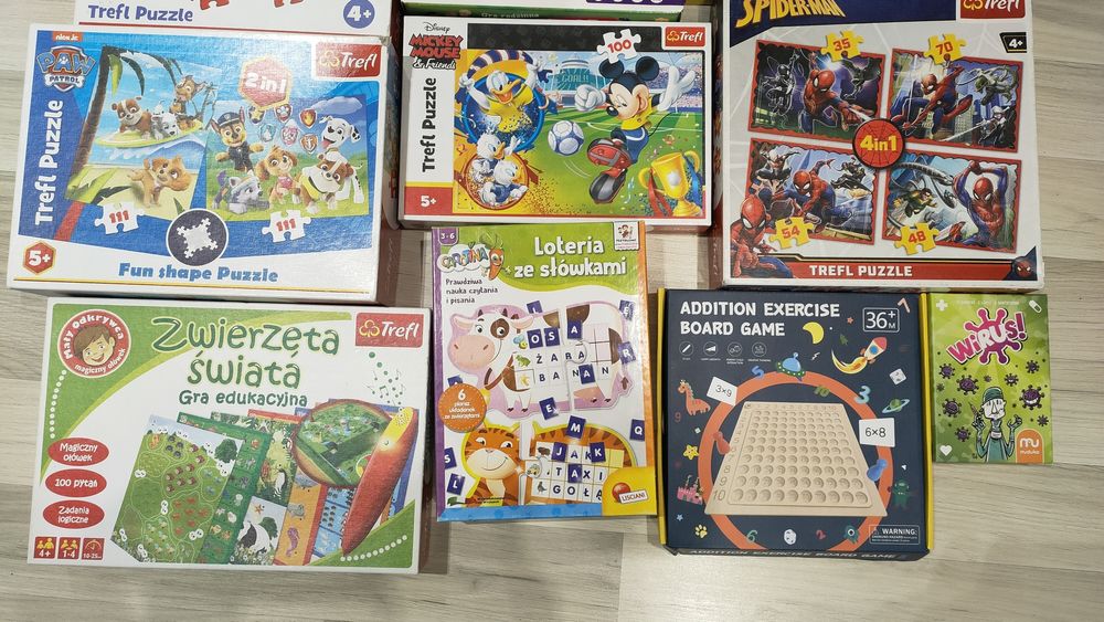 Puzzle Trefl i gry planszowe 13 sztuk.