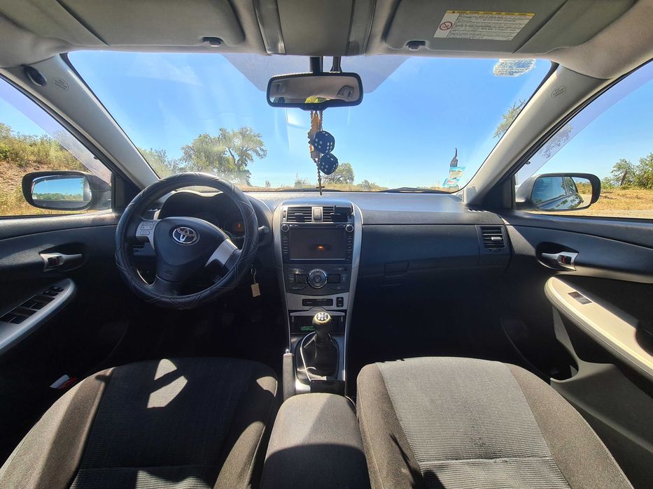 Toyota Corolla e150 — photo 4
