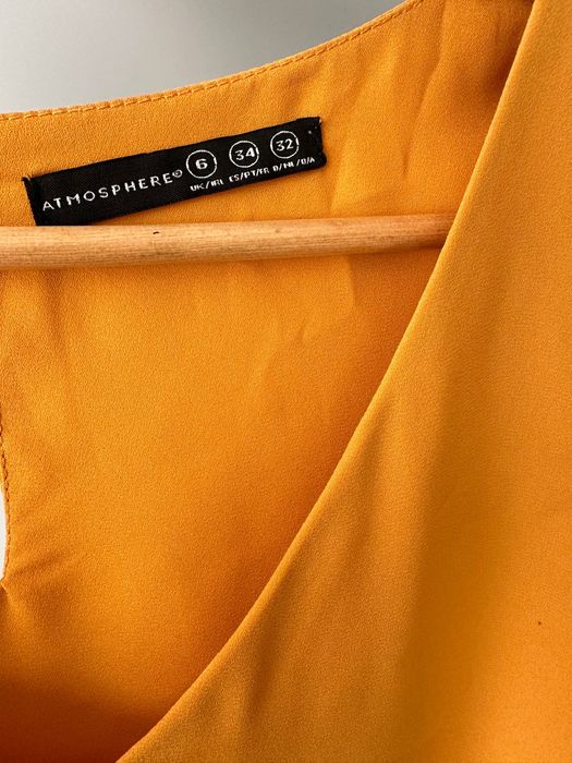 Bluzeczka na lato musztardowa 34 bez rękawów z falbanką oversize