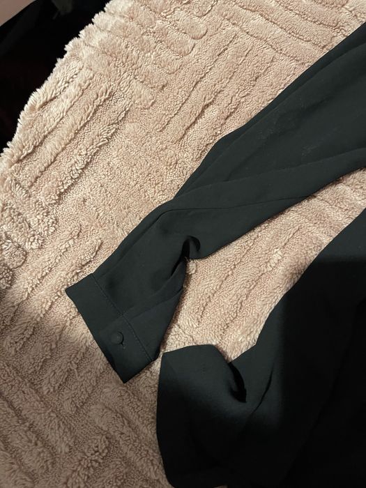 Czarna bluzka z ozdobami bling bling 40