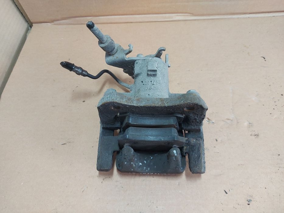 / Megane III 3 zacisk hamulcowy prawy tył