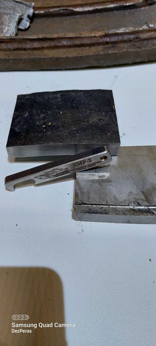 Брелок-відкривачка  із катка БМП. Сувенір.