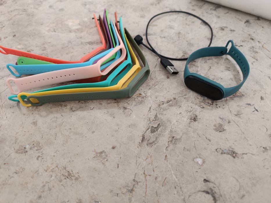 Relógio Xiaomi com várias braceletes