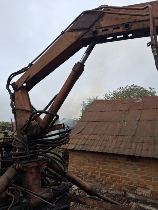 Грейферний погружчик юмз