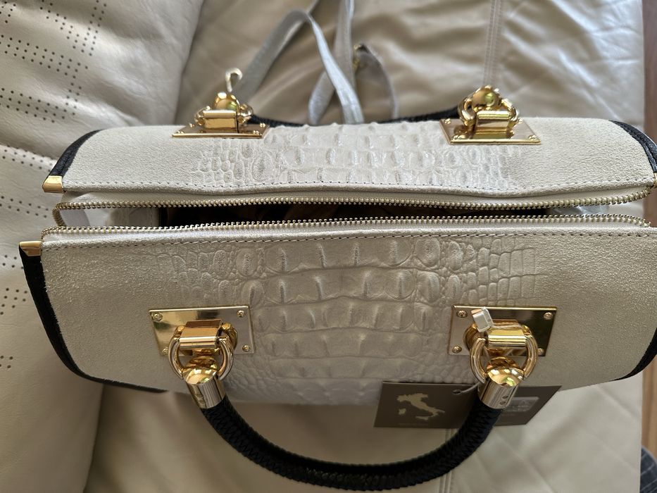 Нова кожана сумка.