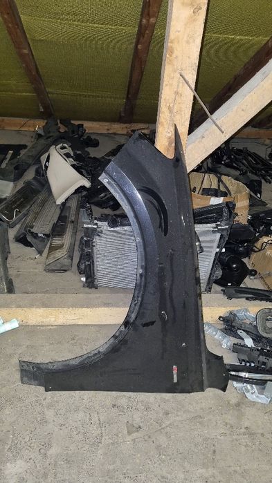 Крило ліве ауді q7 4m колір lc9x в ідеальному стані