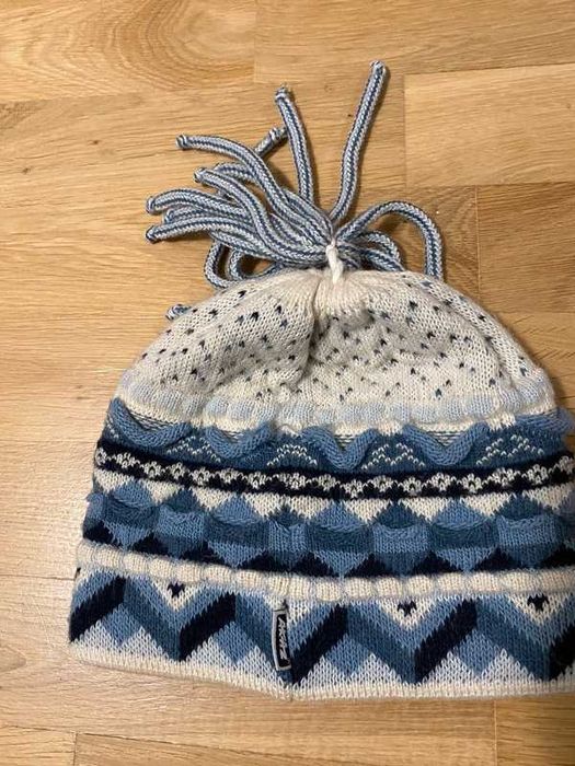 Czapka zimowa z frędzlami, Aktiz
