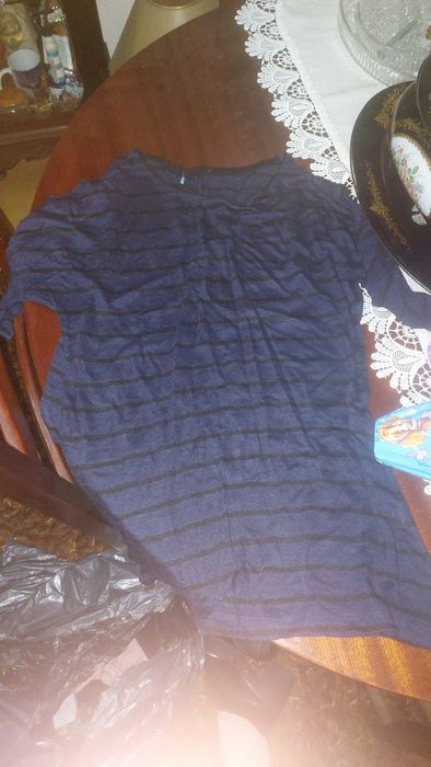 Roupa usada em bom estado