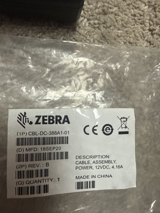 Ładowarka i 4 akumulatory Zebra