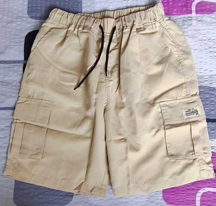 Nowe męskie spodenki - szorty jasny beż, z kieszeniami roz."s"