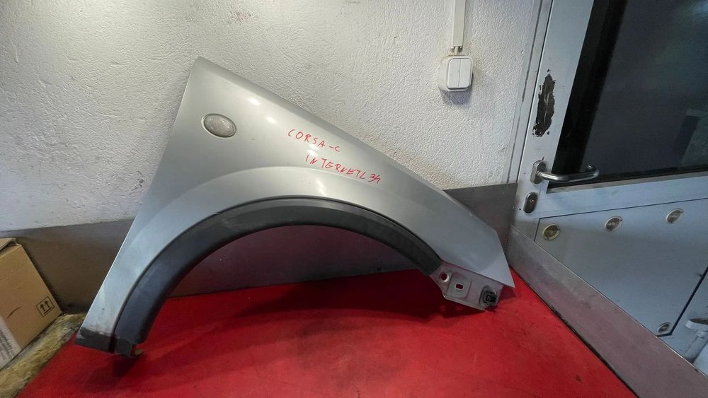 Błotnik prawy przód Opel CORSA C