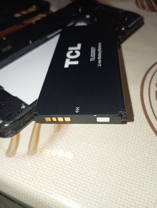 Телефон TCL T607