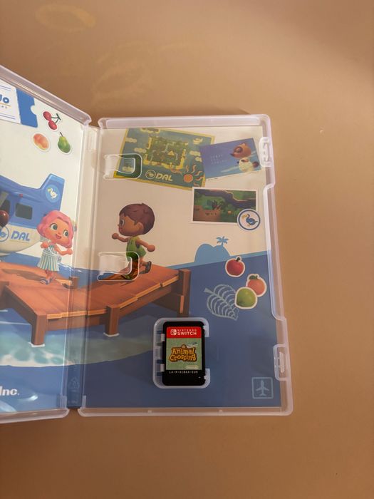 Nintemdo Switch OLDED + Animal Crossing New horizons