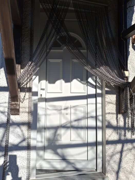 Porta em  PVC e vidro