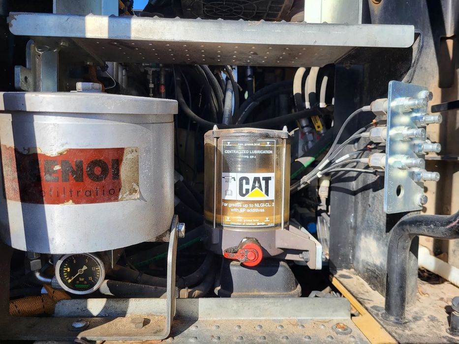 Caterpillar M 318F / z Niemiec /  9300 mth /