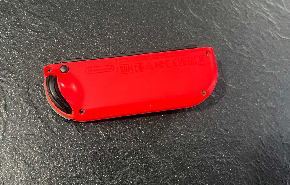 Pad kontroler Joy-Con Nintendo Switch czerwony uszkodzony nie działa analog
