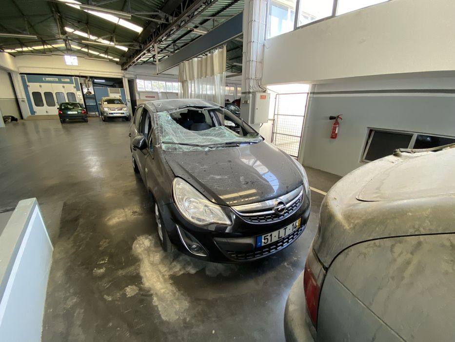 Opel Corsa D 1.2 Gasolina - Salvado