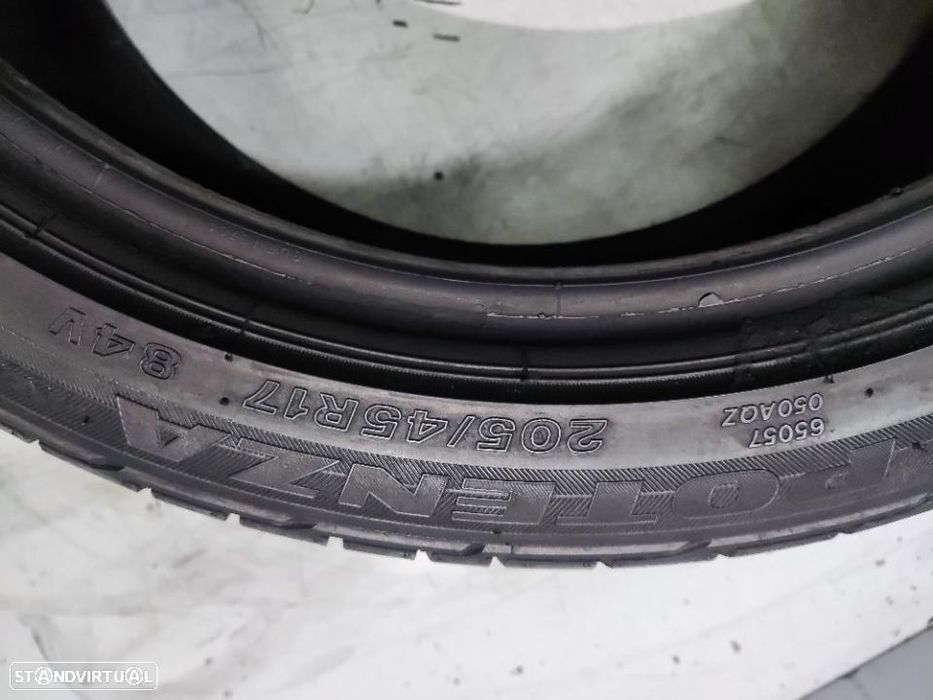 2 pneus semi novos 205-45r17 bridgestone rft - oferta dos portes