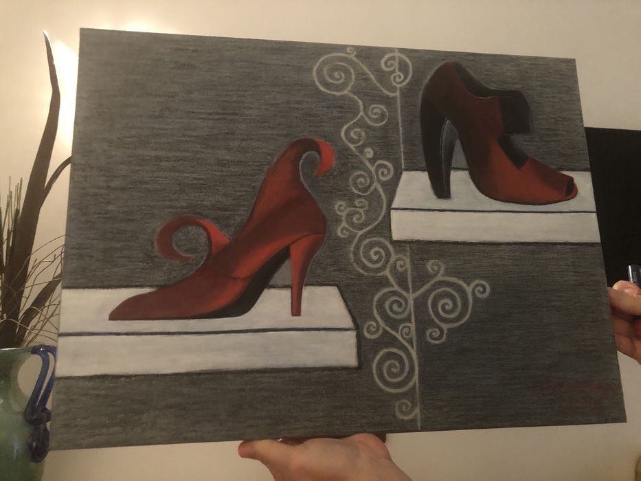 Red shoes in a grey wall