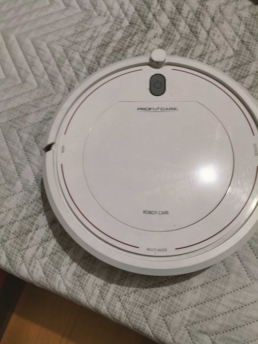 Aspirador robot branco