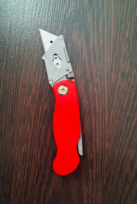 Нож складной строительный Лезвие трапеция