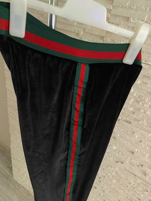 Rezerwacja Joggery spodnie dresowe welurowe z lampasami paski