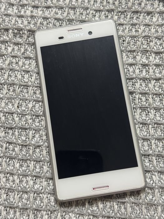 Телефон Sony Xperia E2303