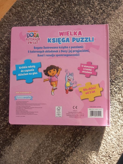 Dora poznaje świat - książka z puzzlami