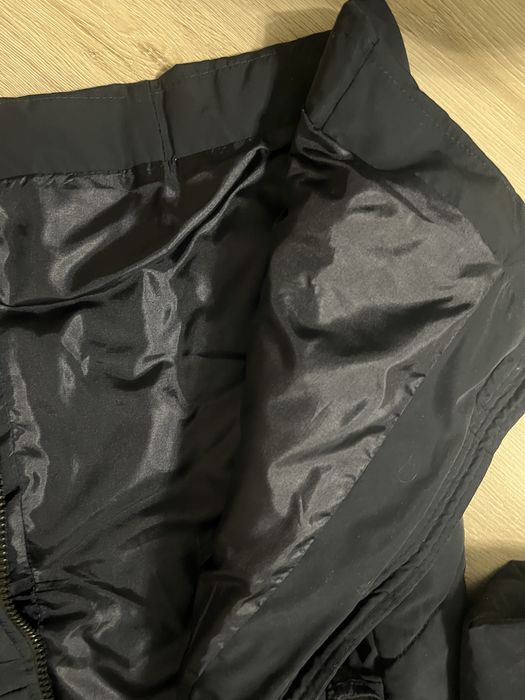 Довга жіноча зимова куртка