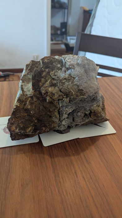 big beautiful rock (copper, silver, granite) to display jewelry or other items
