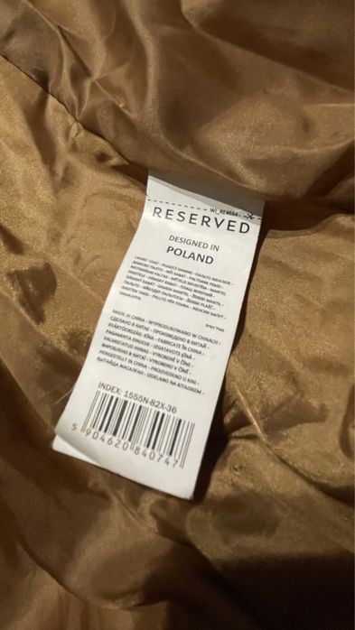 Beżowy puchowy płaszcz damski reserved r.s