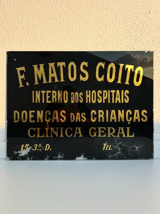 Placa vintage de antigo consultório