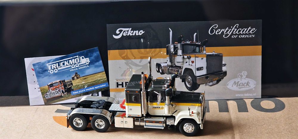Tekno Mack RW Superliner 6x4 with 3-axle lowloader VAN DEN HERIK