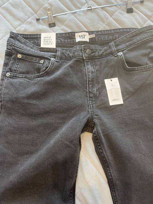 Темно сірі кльошові джинси р XL
