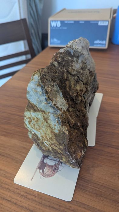 big beautiful rock (copper, silver, granite) to display jewelry or other items