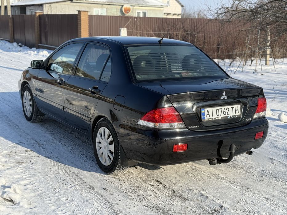 Продам  Mitsubishi Lancer