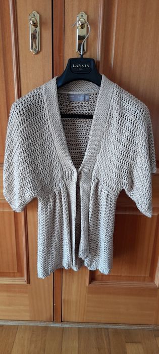 Poncho em tom Creme