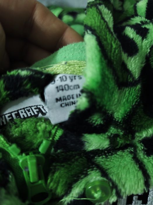 Sprzedam kombinezon minecraft dla chłopca 140