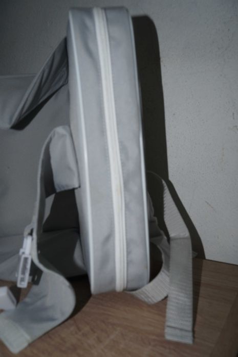 Cadeira de papa portátil (ou assento elevatório de viagem)