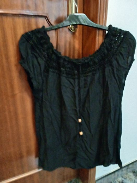 Roupa TAM XL em bom estado