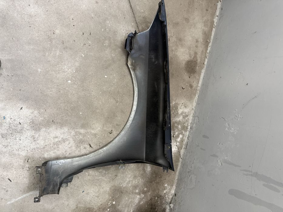 Guarda-lamas Direito Renault Laguna II – Original