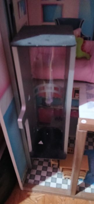 Casa de boneca com acessórios