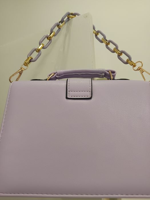 Mala de mão e a tiracolo e porta moedas