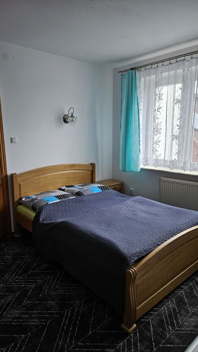 Pokoje i apartamenty z balkonami